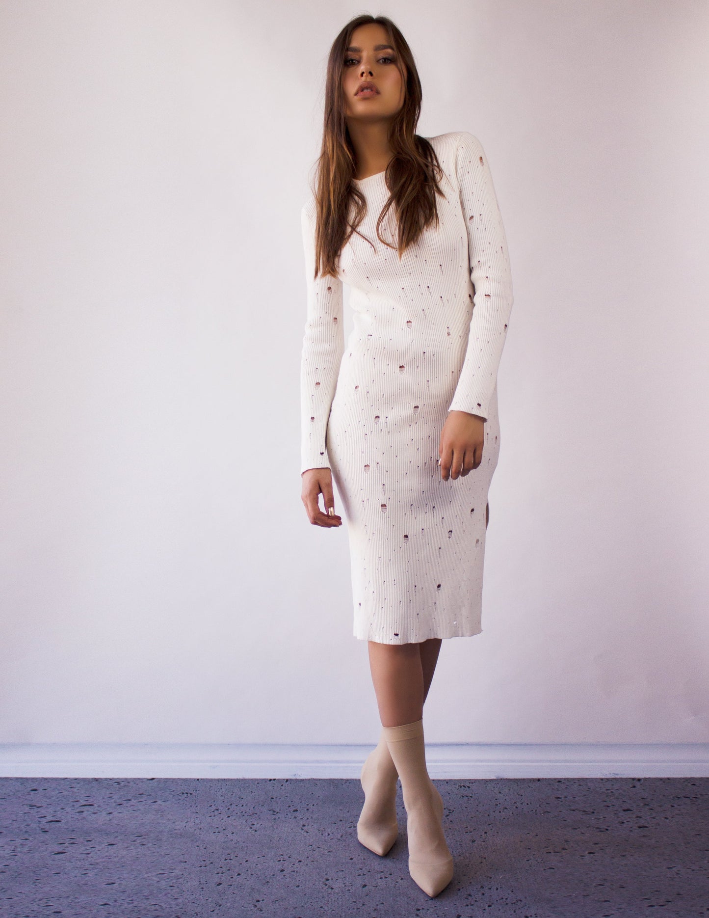 white dress hole blue district vegan fashion