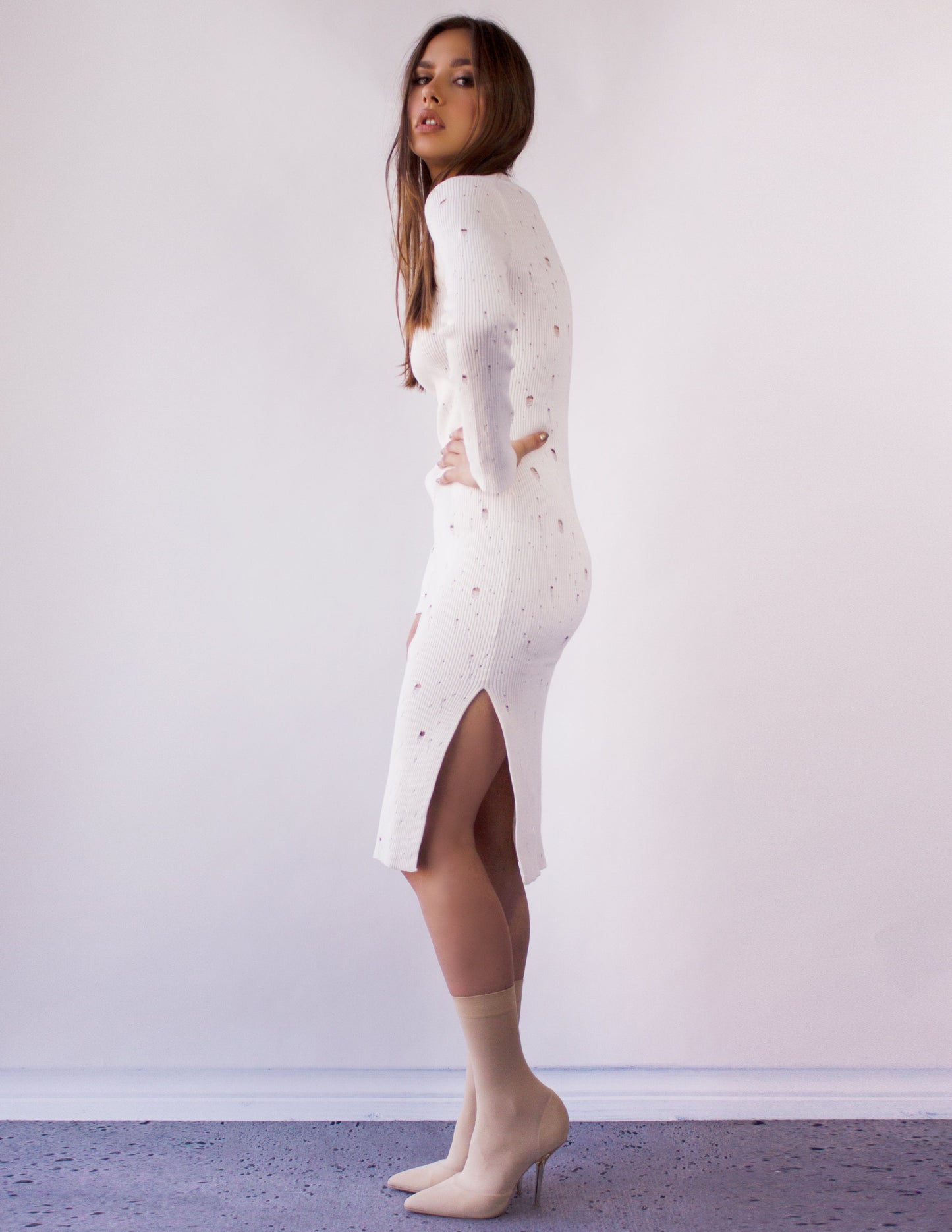 white dress hole blue district vegan fashion