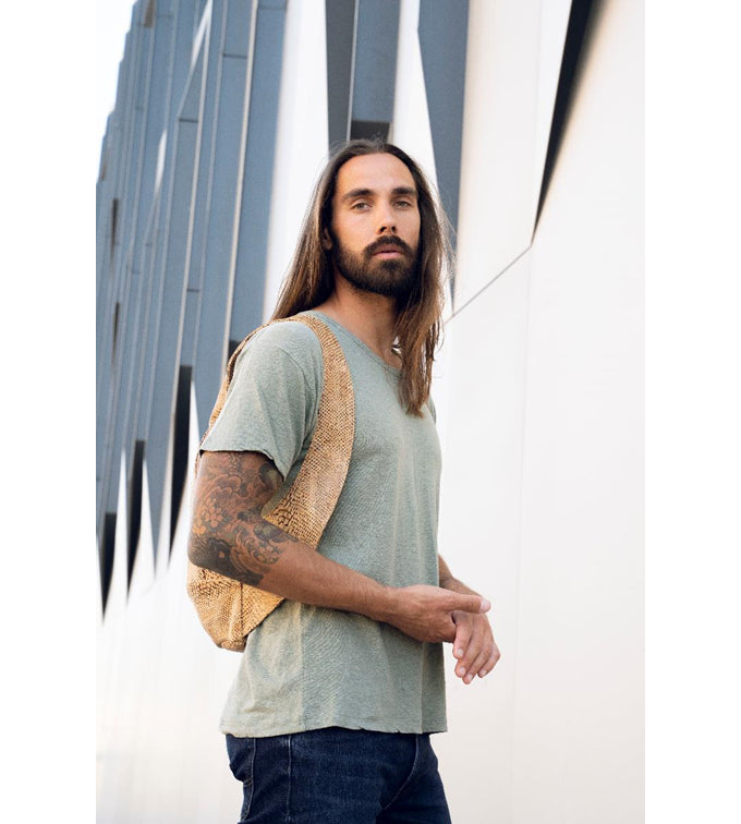 snake skin cork Arsayo backpack with a man model