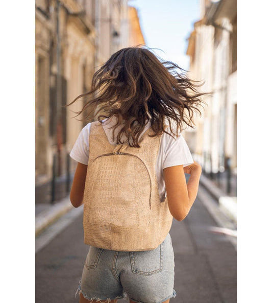 crocodile skin cork Arsayo backpack with a woman model