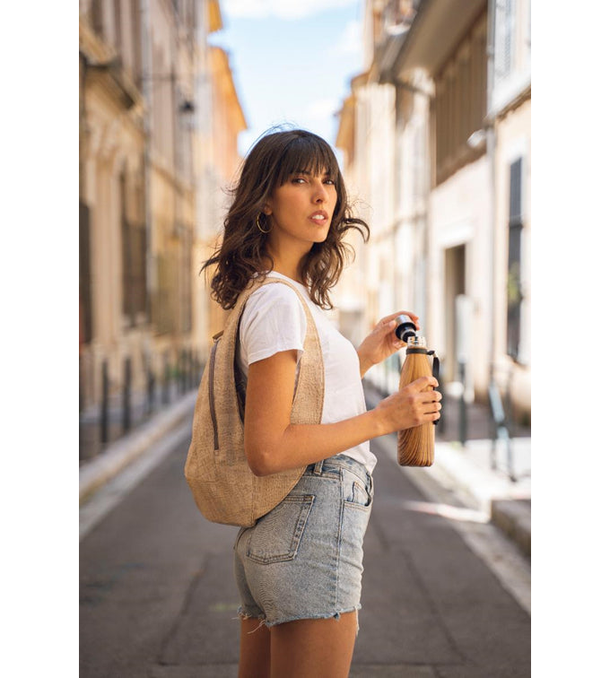 crocodile skin cork Arsayo backpack with a woman model